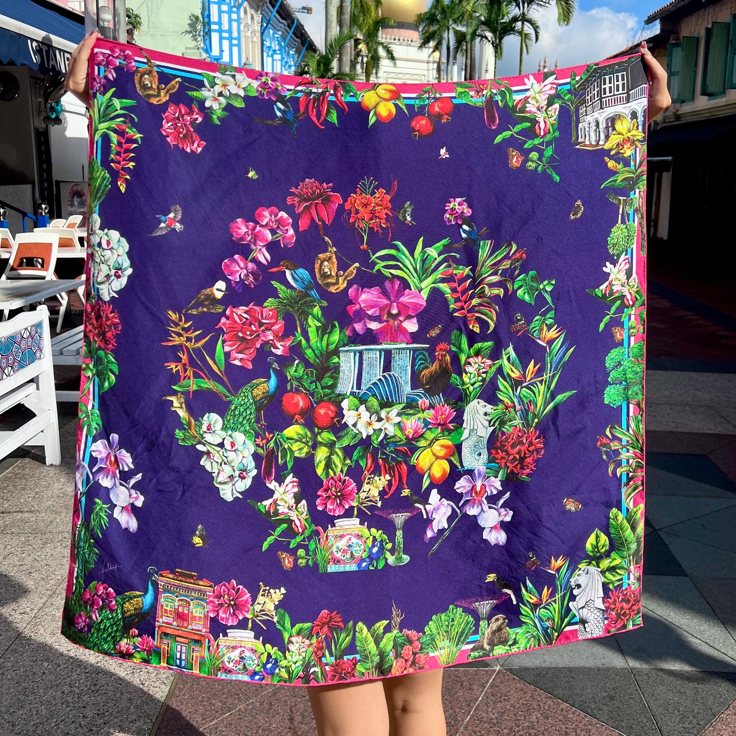 Detailed view of Singapore scarf with Vanda Miss Joaquim and tropical botanicals