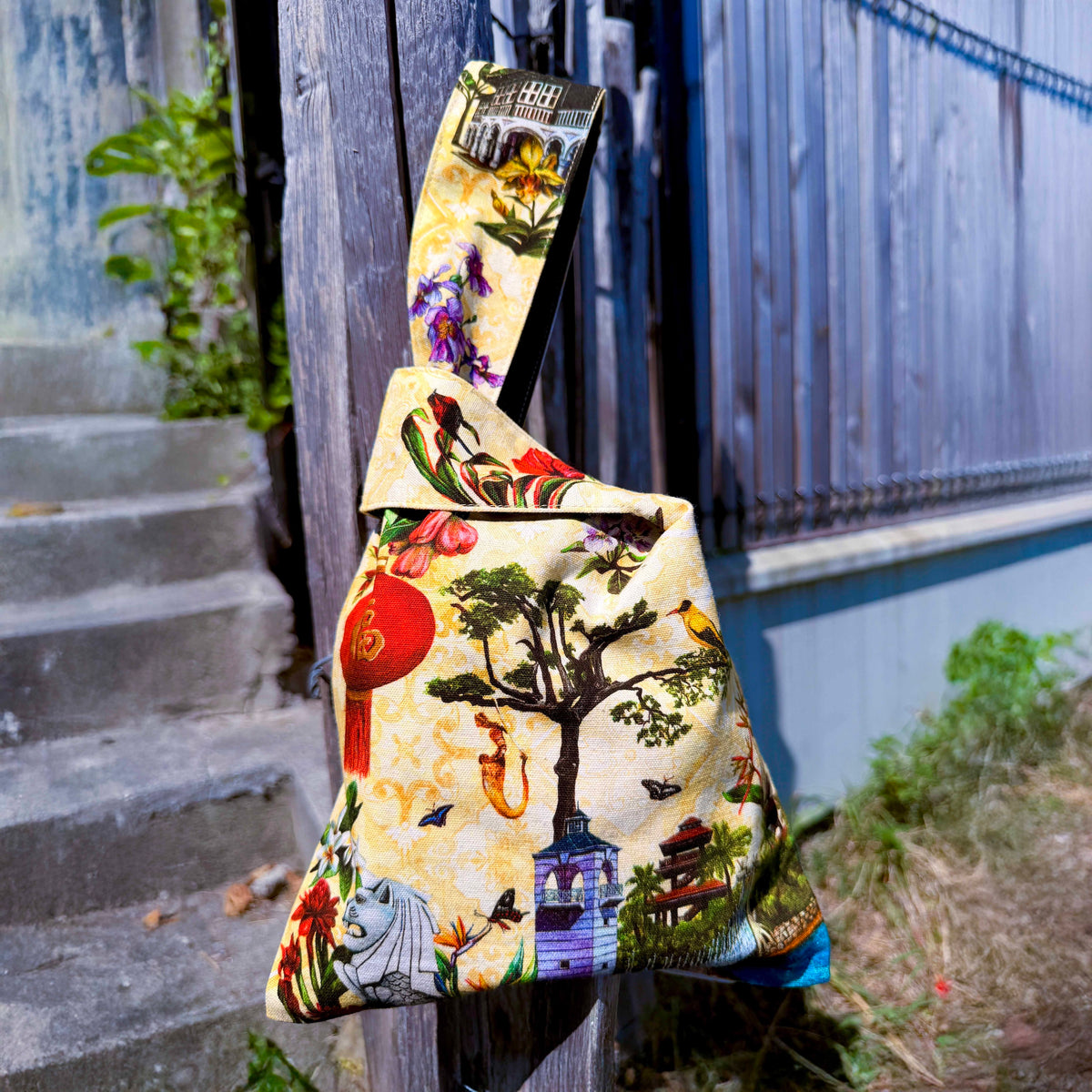 Southern Heritage Japanese Knot Bag showing Sentosa, Gallop House, and Merlion artwork