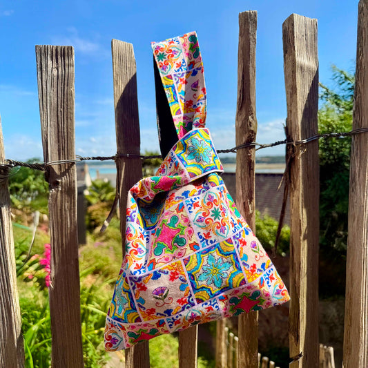 Cultural Harmony Japanese Knot Bag featuring Peranakan and Mediterranean ceramic tile art